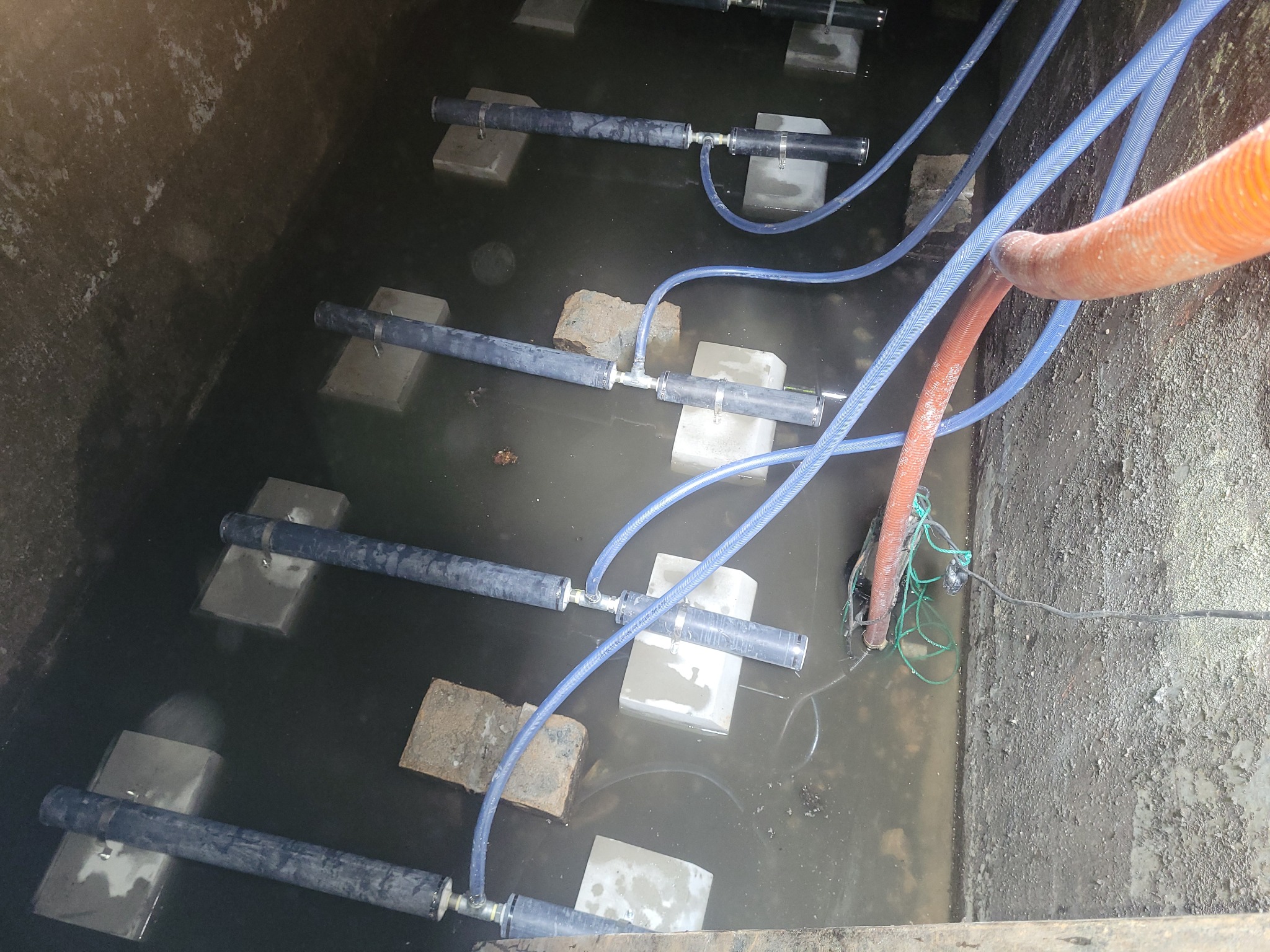 Diffuser lines installed inside an aeration tank